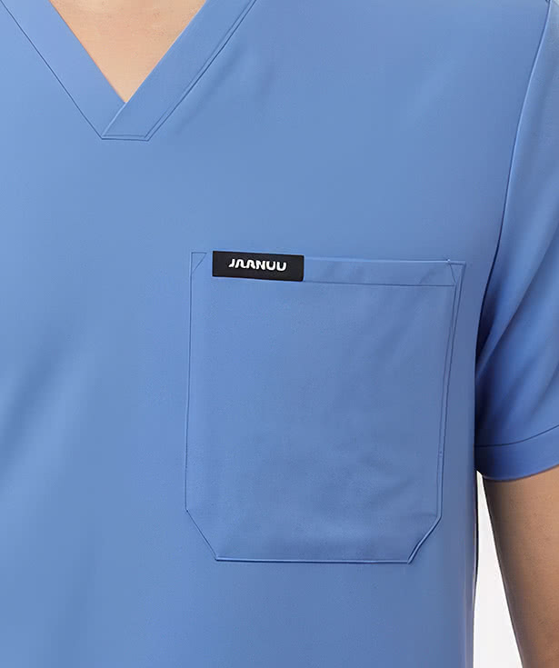 Jaanuu Holmes Everyday One-Pocket V-Neck Scrub Top - Embroidered