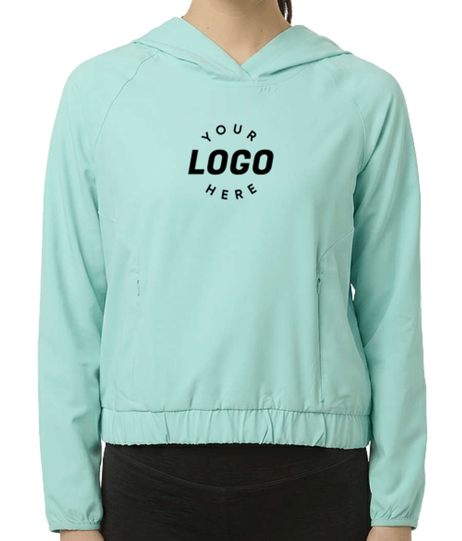 Core 365 Women's Shoreline Recycled UPF 50+ Hooded Windbreaker in Sea Glass