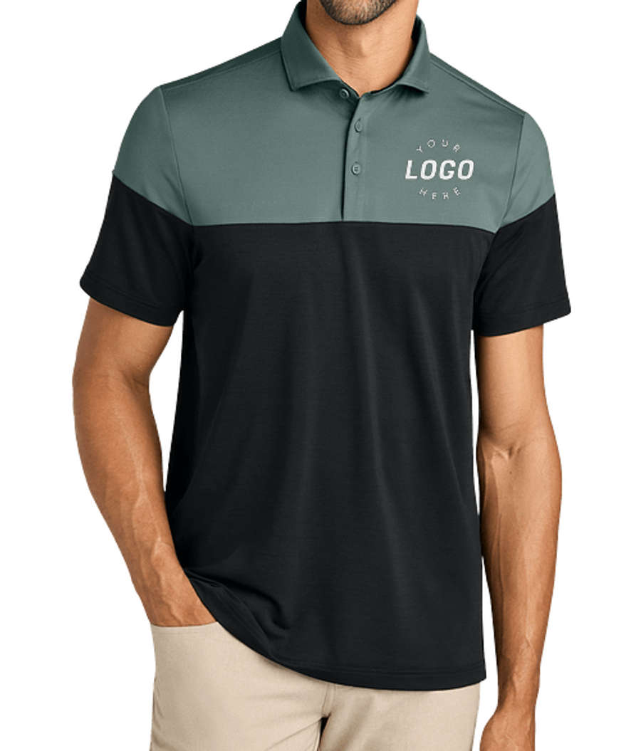 TravisMathew Onward Colorblock Performance Polo - Embroidered in Balsam Green / Black